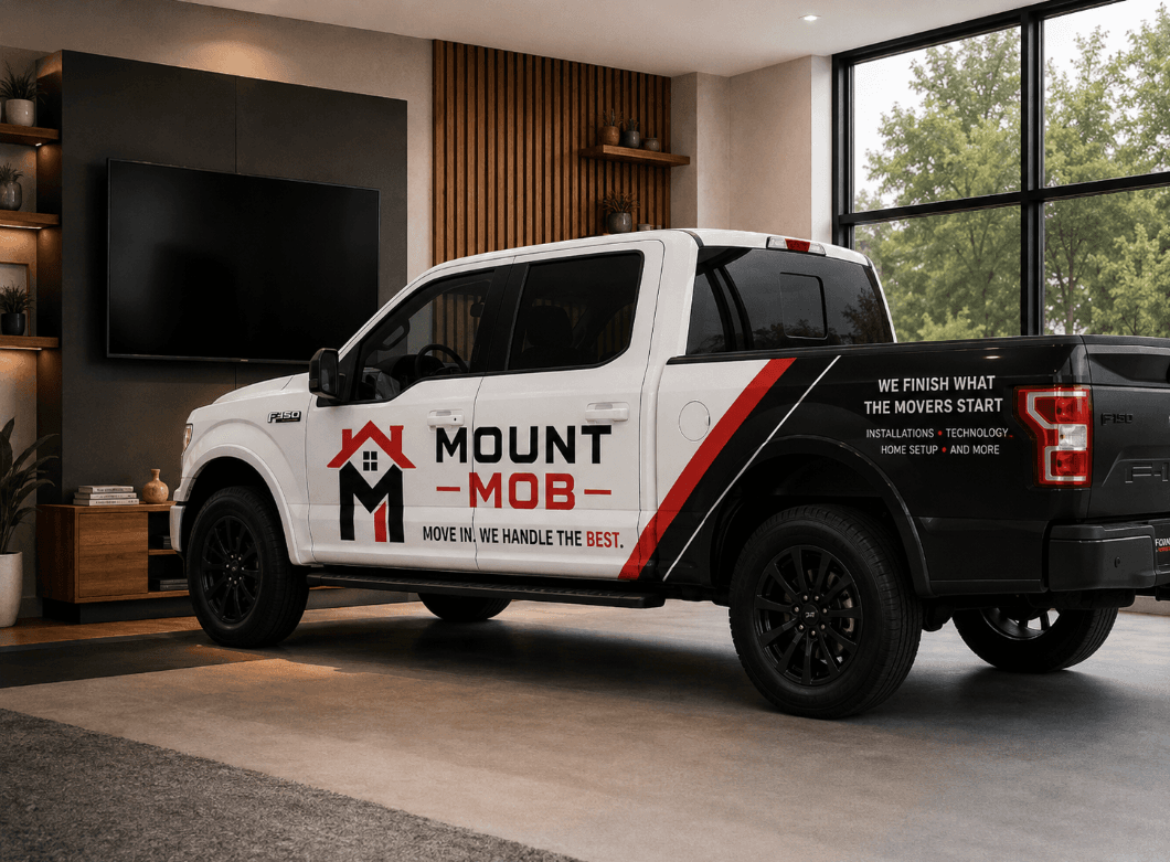Mount Mob truck parked beside a finished home entertainment setup
